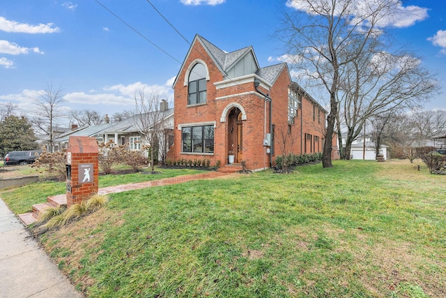 traditional home featuring brick siding and a front lawn