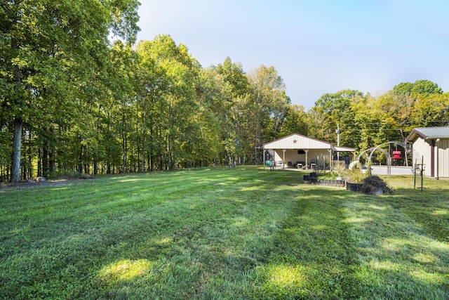 view of yard with a wooded view