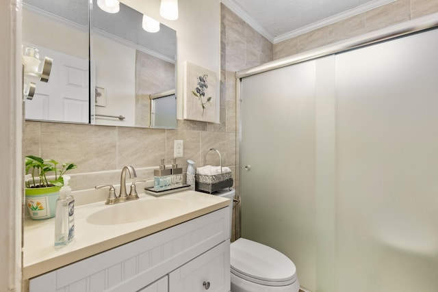 bathroom featuring crown molding, tasteful backsplash, toilet, a shower with shower door, and vanity