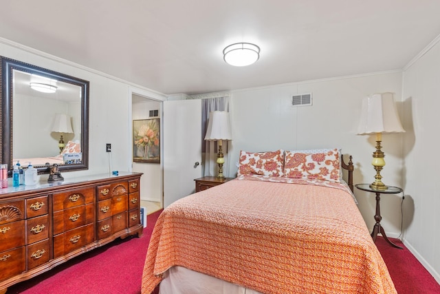 bedroom featuring dark colored carpet and visible vents