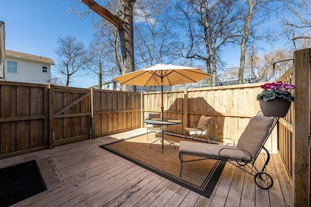 wooden deck featuring fence