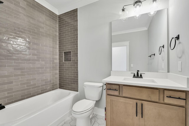 bathroom featuring toilet, ornamental molding, tile patterned floors, tub / shower combination, and vanity