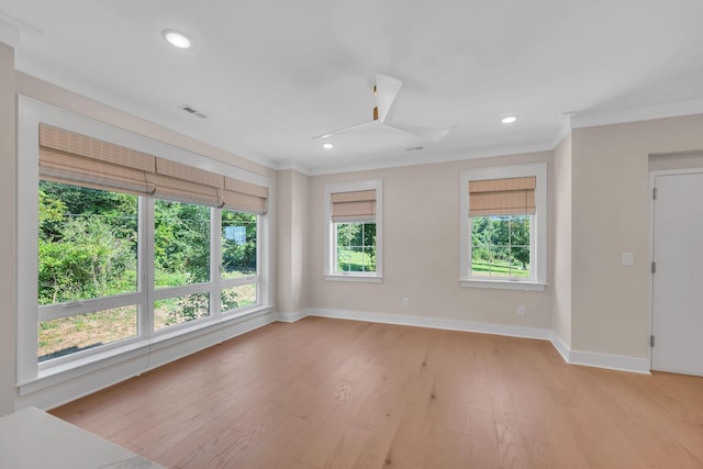 unfurnished room with baseboards, recessed lighting, and light wood-style floors