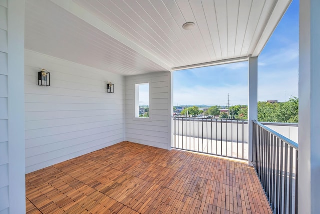 view of patio featuring a balcony