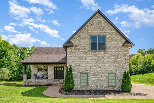 64 Harbor Pt, Lebanon, TN 37087 - view of front of home featuring a front lawn and brick siding