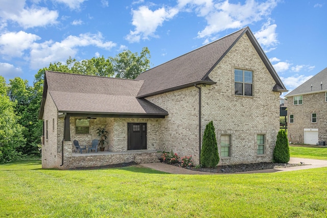 64 Harbor Pt, Lebanon, TN 37087 - view of front of property featuring brick siding, a front lawn, and roof with shingles