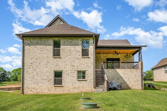64 Harbor Pt, Lebanon, TN 37087 - back of property featuring a ceiling fan, stairway, a lawn, and brick siding