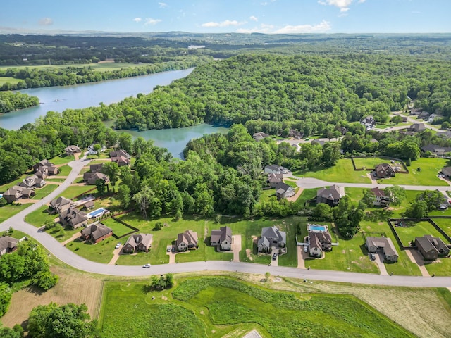 64 Harbor Pt, Lebanon, TN 37087 - aerial view of property's location featuring a nearby body of water, a heavily wooded area, and nearby suburban area