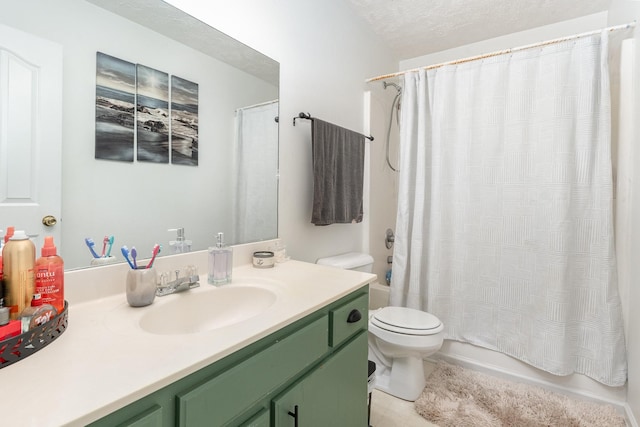 bathroom with tile patterned floors, toilet, shower / bath combo, a textured ceiling, and vanity