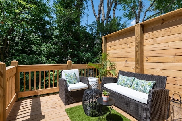 wooden deck with outdoor lounge area