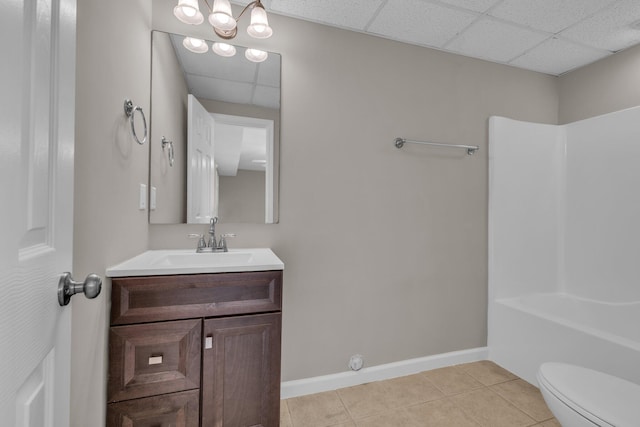 8115 Standifer Gap Rd, Chattanooga, TN 37421 - full bathroom with vanity, toilet, tile patterned floors, baseboards, and a drop ceiling