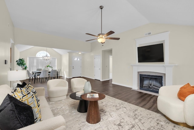 8115 Standifer Gap Rd, Chattanooga, TN 37421 - living room with visible vents, ceiling fan with notable chandelier, wood finished floors, and lofted ceiling