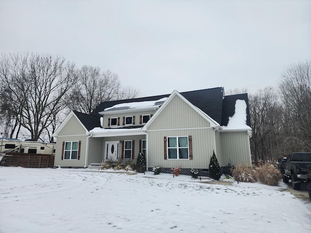 view of front of home with fence