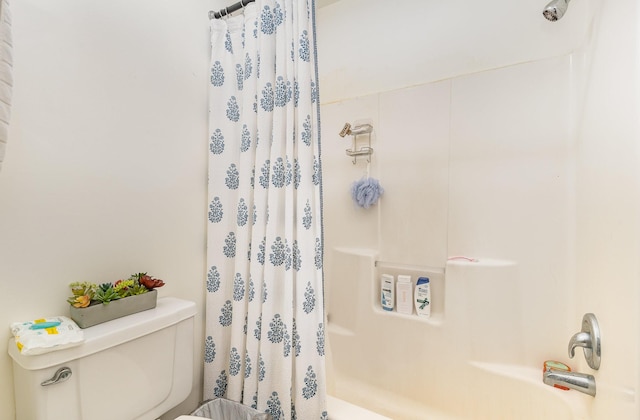 bathroom with toilet and shower / bathtub combination with curtain