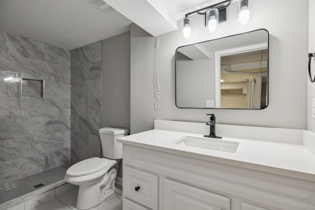 bathroom with marble finish floor, visible vents, toilet, vanity, and tiled shower