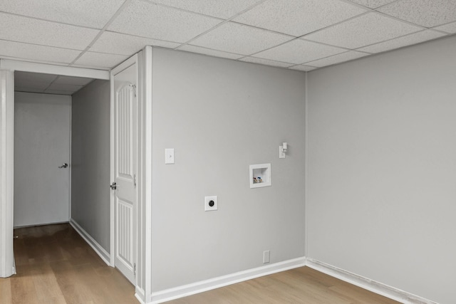 laundry room with washer hookup, electric dryer hookup, wood finished floors, laundry area, and baseboards