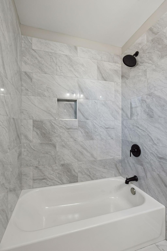 full bath with shower / bathing tub combination