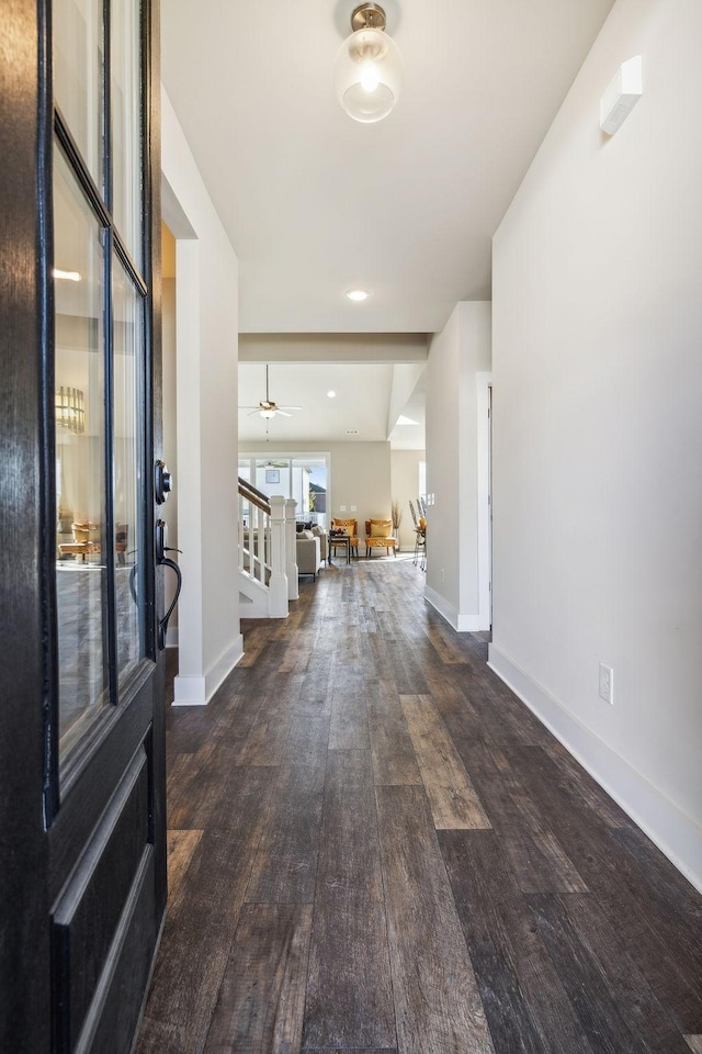 entrance foyer featuring baseboards, dark wood finished floors, ceiling fan, stairway, and recessed lighting