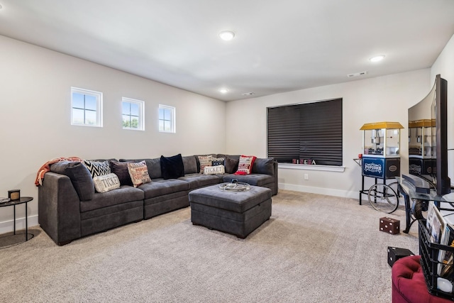 carpeted living room featuring recessed lighting, visible vents, and baseboards