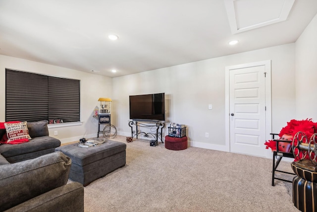 carpeted living room with recessed lighting, attic access, and baseboards