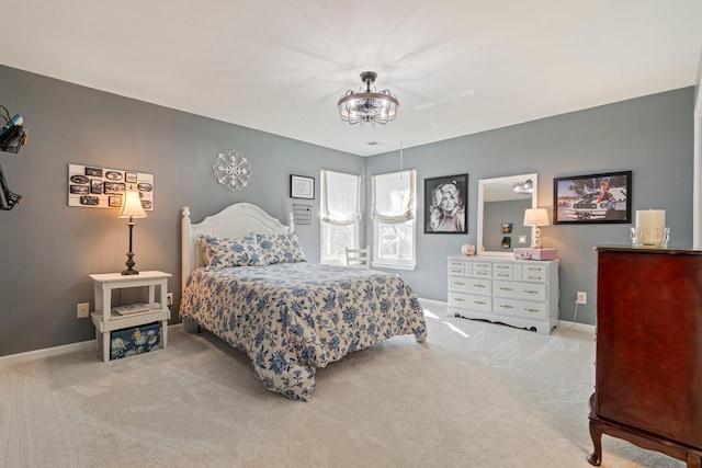 bedroom with carpet and baseboards