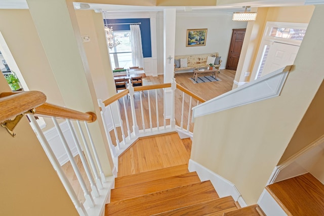 stairs with wood finished floors