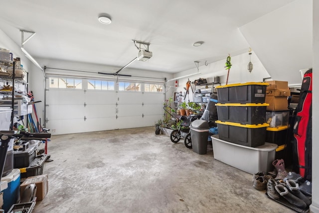 garage featuring a garage door opener