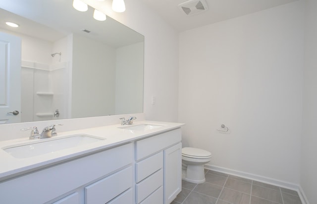 full bathroom featuring a sink, a shower, toilet, and tile patterned flooring