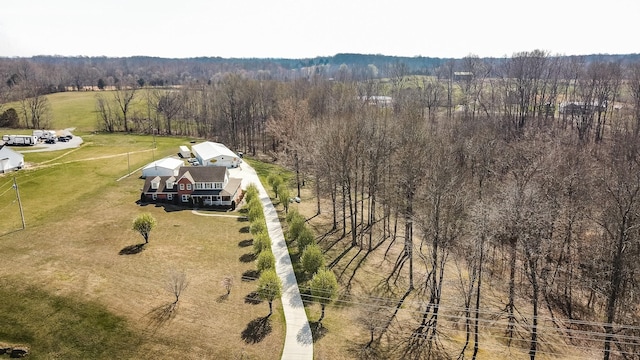 drone / aerial view with a rural view and a forest view