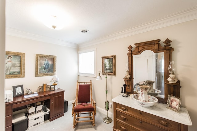 sitting room featuring light carpet, visible vents, baseboards, and ornamental molding