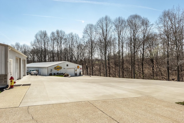 view of side of property featuring an outdoor structure