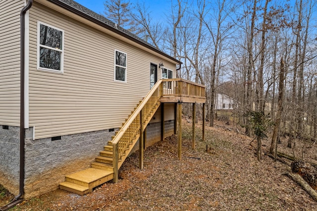 exterior space with crawl space, stairway, and a deck