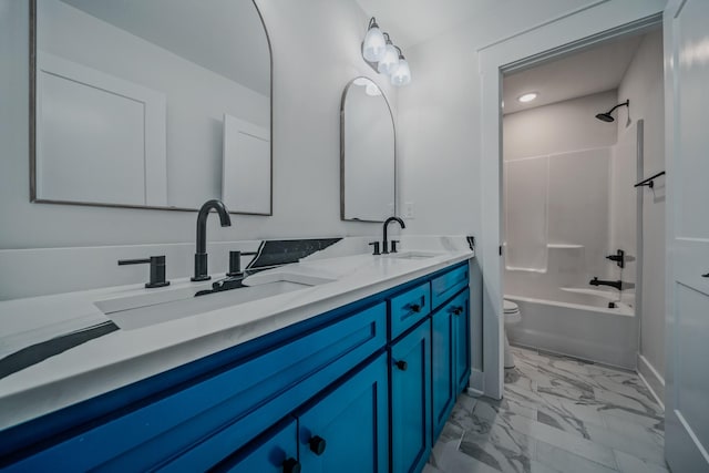 bathroom with bathtub / shower combination, marble finish floor, a sink, and double vanity