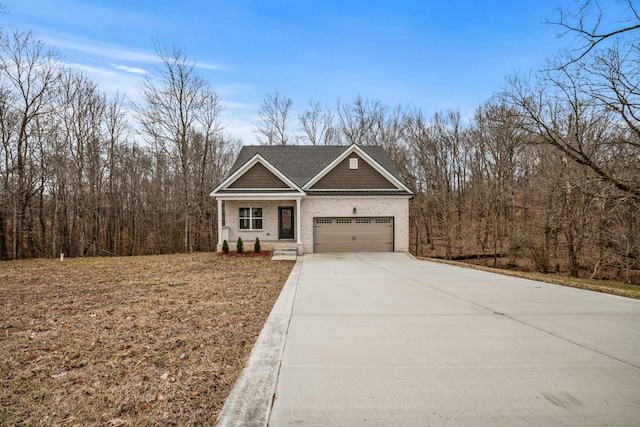 view of front of house with a garage and driveway