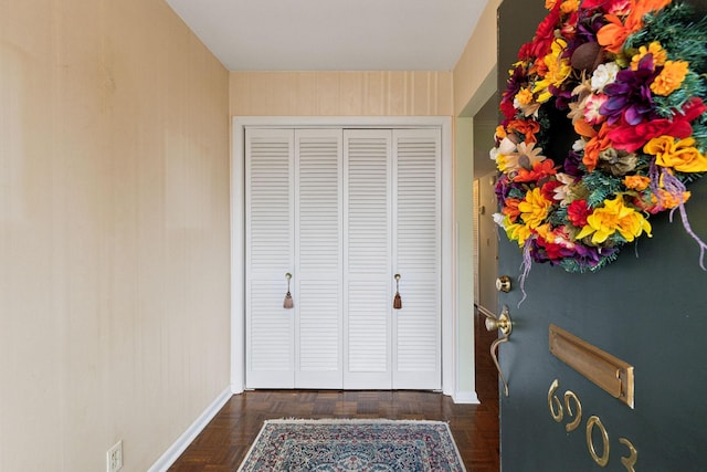 entryway featuring baseboards