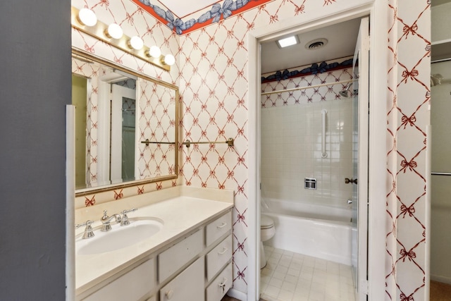 full bathroom with wallpapered walls, visible vents, toilet, tub / shower combination, and vanity