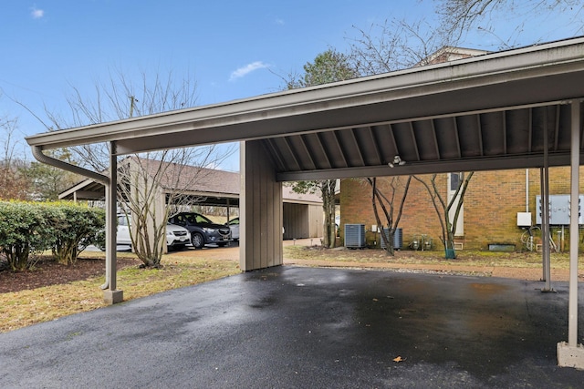 view of parking featuring a carport