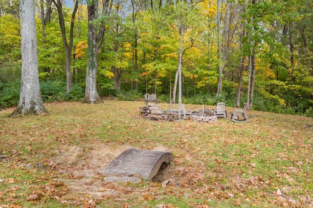 view of yard with a forest view