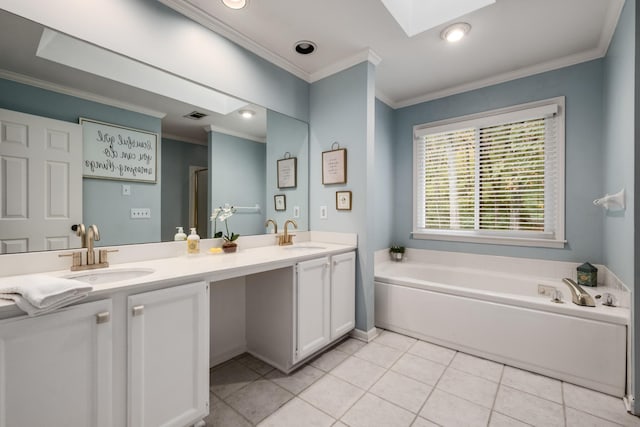 full bathroom featuring ornamental molding, a skylight, tile patterned flooring, and a sink