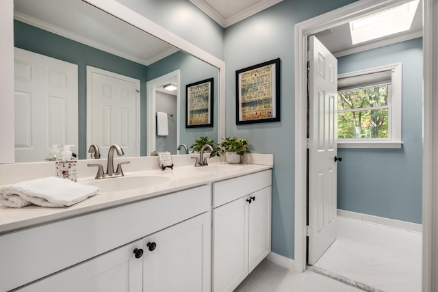 bathroom featuring double vanity, ornamental molding, tile patterned flooring, and a sink