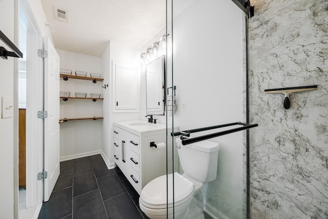 bathroom with toilet, visible vents, baseboards, vanity, and tile patterned floors