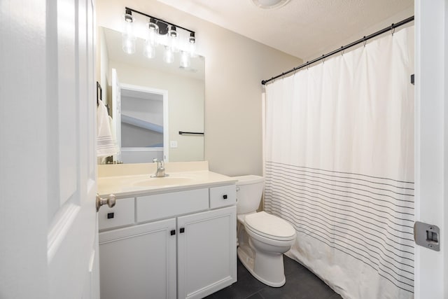 full bath featuring a textured ceiling, tile patterned flooring, toilet, a shower with shower curtain, and vanity