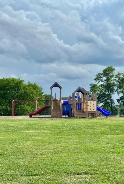 community play area with a lawn