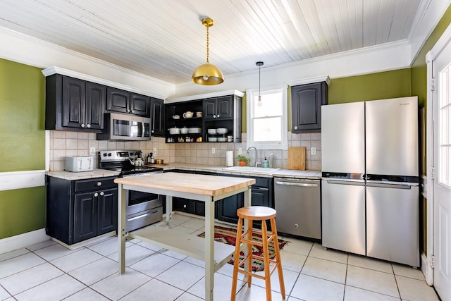 kitchen featuring open shelves, stainless steel appliances, light tile patterned floors, backsplash, and a sink