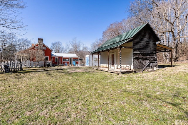 view of outdoor structure with fence