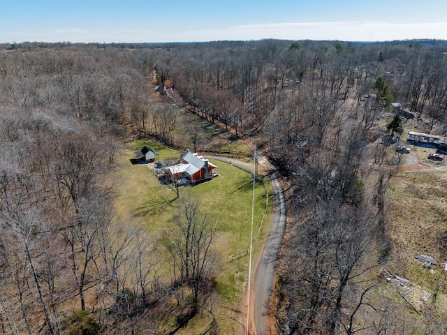 bird's eye view with a rural view and a view of trees