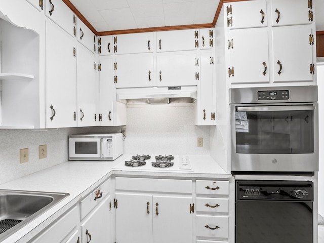 kitchen featuring white cabinets, under cabinet range hood, white appliances, and light countertops