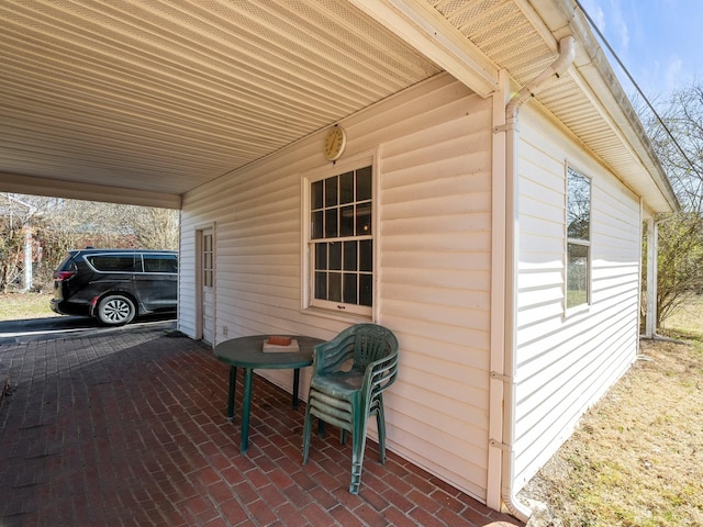 view of patio featuring a carport