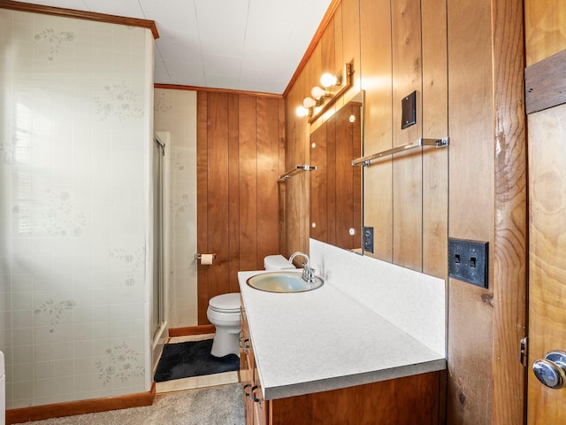 full bath with wood walls, toilet, vanity, and a stall shower