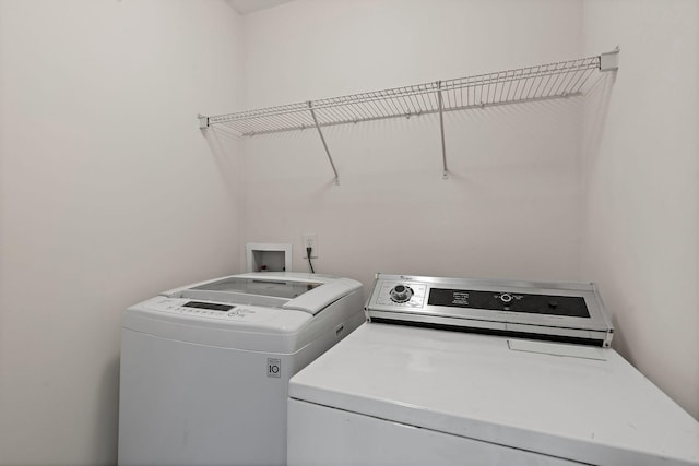 laundry area featuring laundry area and washer and dryer